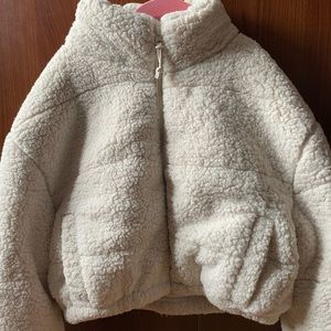 Puffy jacket for winter.Really comfy inside when you wear it.